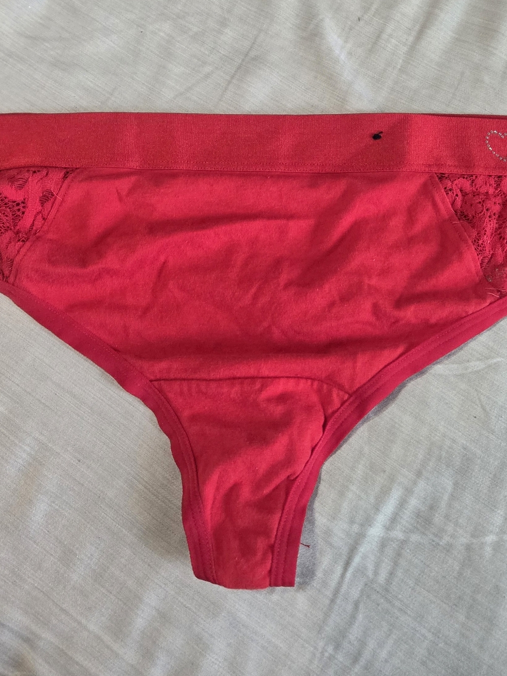 Women’s Red Lace Thong Panty with Heart Rhinestones - Picture 2 of 3